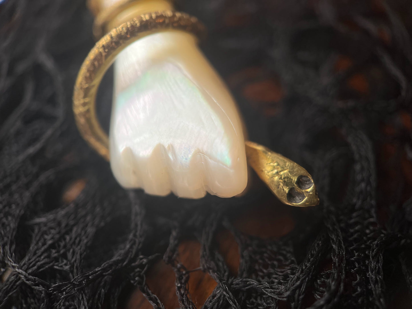 Turn of the Century Mother of Pearl Hand with Snake Pendant