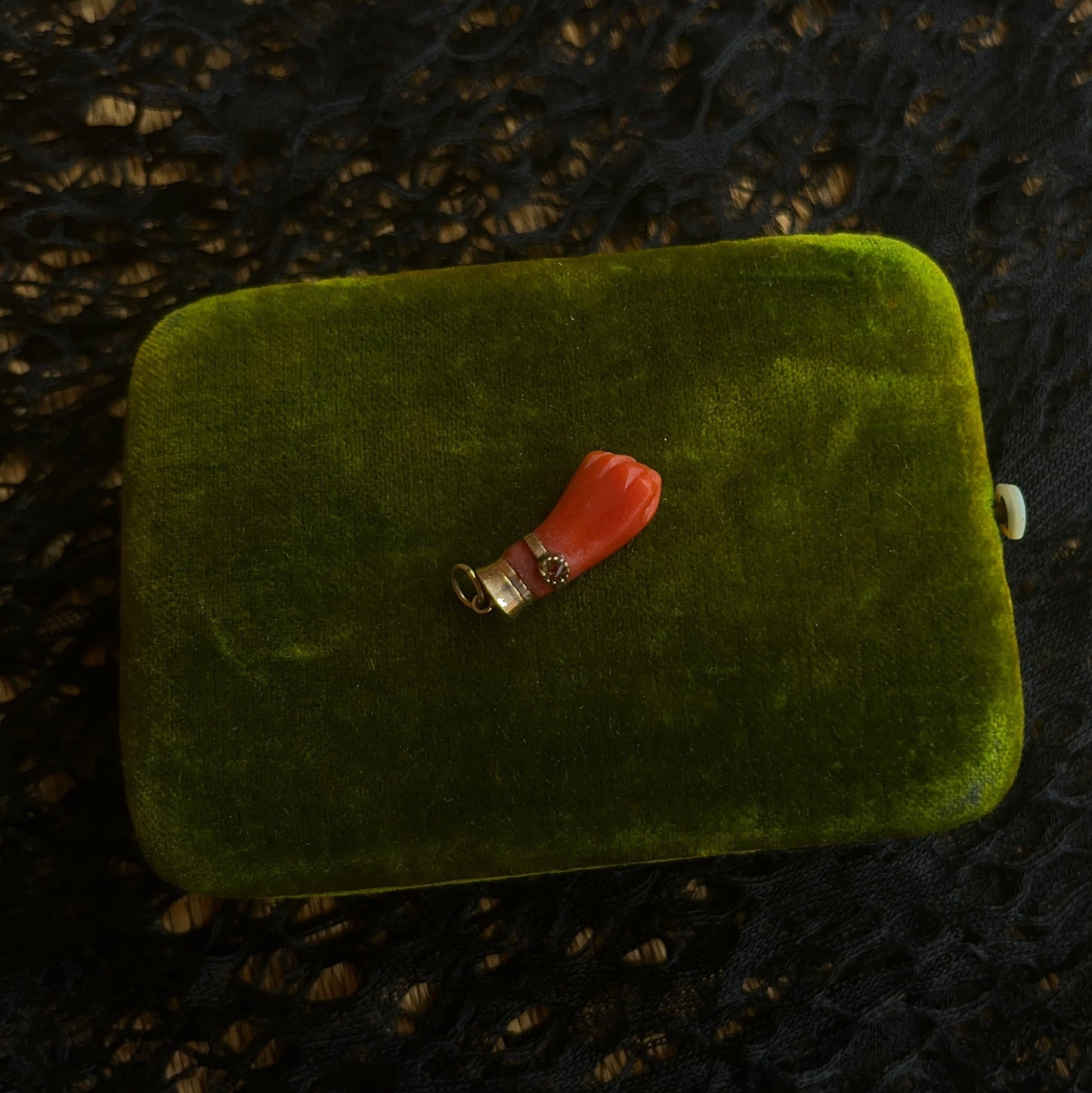 19th c. Carved Coral Fist Pendant | As Is