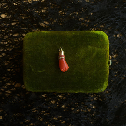 19th c. Carved Coral Fist Pendant | As Is