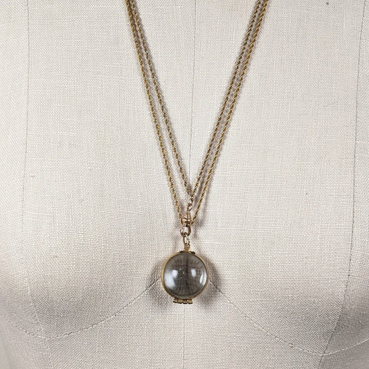 Early 20th c. Pools of Light Locket + Chain