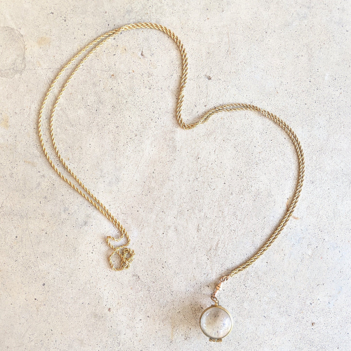 Early 20th c. Pools of Light Locket + Chain