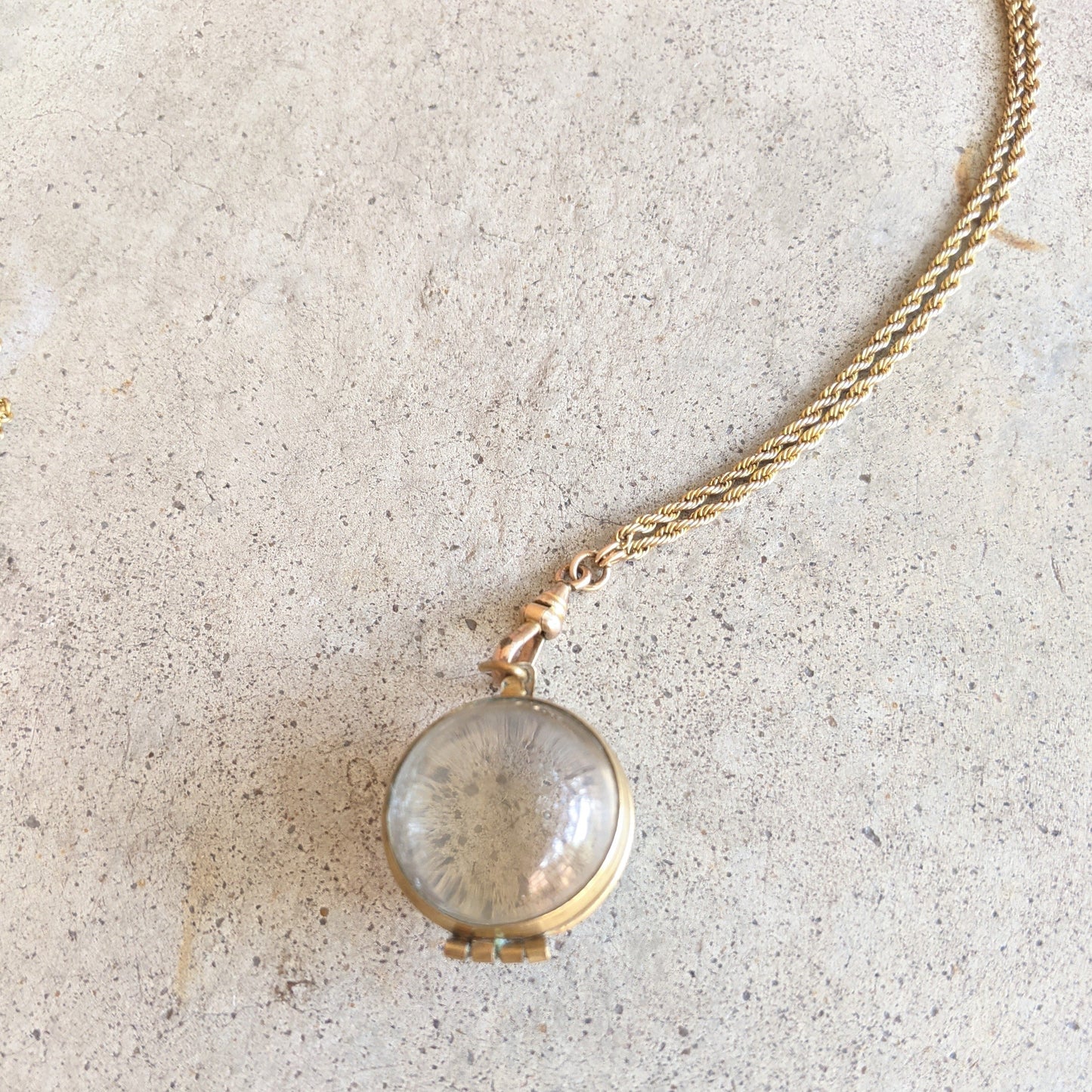 Early 20th c. Pools of Light Locket + Chain