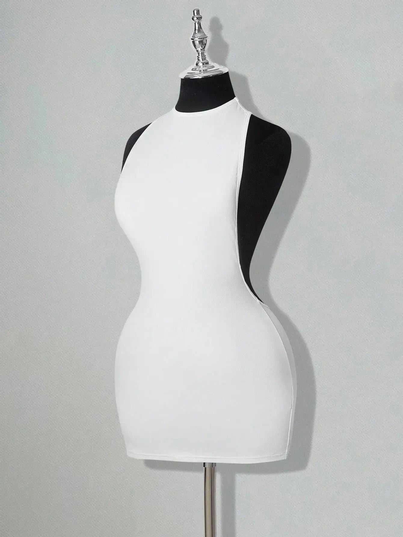 White bodycon mini dress with criss-cross backless design and sleeveless fit
