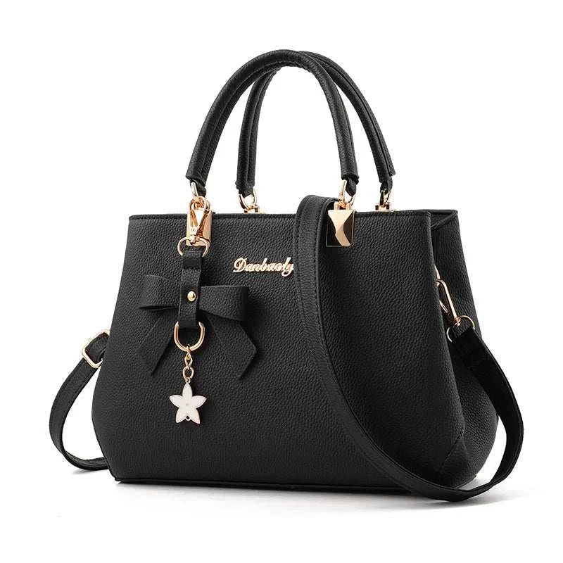 Large capacity Korean style women's handbag with bow decoration and zipper closure for autumn and winter 2023 trends