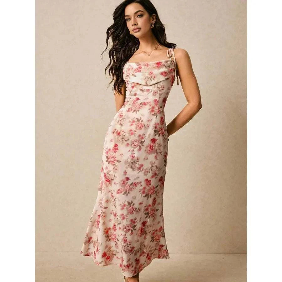 Middle-aged woman wearing a knee-length women's floral print dress with twist front and bow neckline
